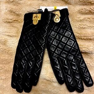Brand new with tags, Michael Kors women's gloves black with gold lock logo in M